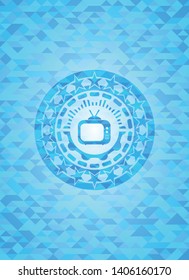 old tv, television icon inside sky blue emblem with mosaic background