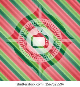 old tv, television icon inside christmas emblem background.