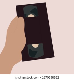 Old video disk in hand, illustration, vector on white background.