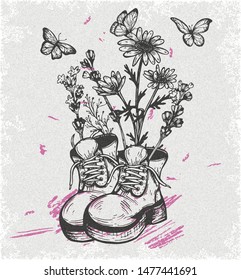 old vintage boots filled with wild flowers