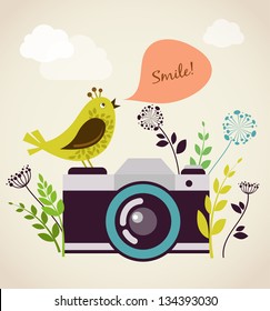 old vintage camera with bird