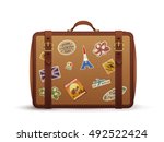 Old vintage leather suitcase with travel stickers, vector illustration isolated on white