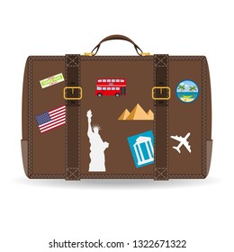 Old vintage leather suitcase with travel stickers. Vector image of travel suitcase with patches set in retro style.