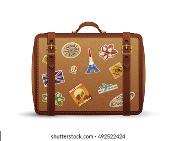 Old vintage leather suitcase with travel stickers, vector illustration isolated on white