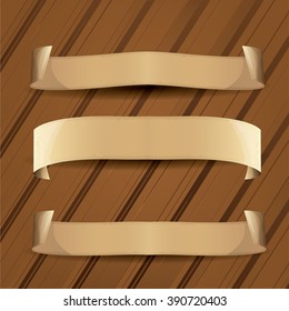 old vintage paper ribbon scroll on old wooden background