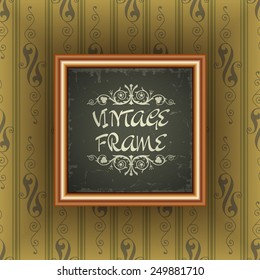 Old wallpaper with vintage frame
