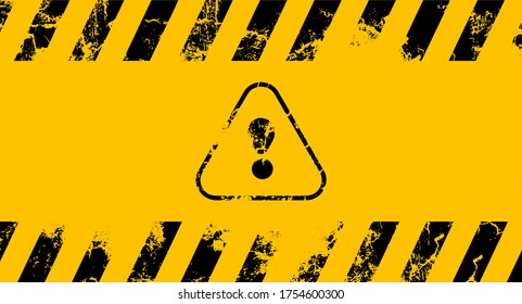 Signo de advertencia antiguo con rayas negras sobre fondo amarillo.