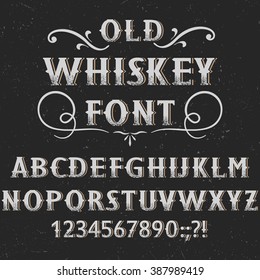 Old whiskey  label font and sample label design with decoration. Vintage font. Fine label font. Handcrafted font. Decoration font. Font style. Retro font. Old font