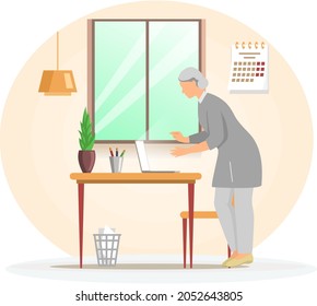 Old woman with computer at workplace. Freelancer grandmother chatting and working online. Beauty female character standing near table with laptop. Senior lady dealing with technology, using gadget