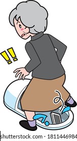 An old woman dropping her mobile phone when she crosses a Japanese-style toilet