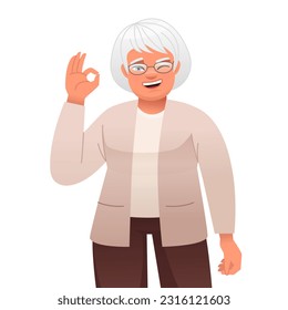 Old woman in glasses winks and shows an OK sign with her hand. Elderly gray-haired grandmother says that everything is fine. Vector cartoon illustration isolated on white background.