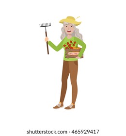 Old Woman With Rake And Crate Of Vegetables