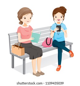 Old Woman Reading Book, Young Woman Playing Smartphones. They Sitting On Bench Together, People, Lifestyle, Generation, Age