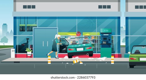 The old woman was shocked after driving her car into a store.