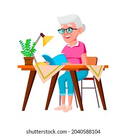 Old Woman Sitting At Table And Reading Book Vector. Smiling Elderly Lady Sit At Desk And Read Educational Book Literature. Character Aged Grandmother Studying Flat Cartoon Illustration