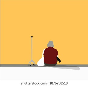 Old woman sitting with walker on street. The elderly lady is contemplating alone Concept of being alone, lonely, old and retired.