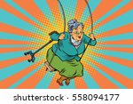 Old woman swinging on a baby swing. Pop art retro vector illustration. Granny with a crutch