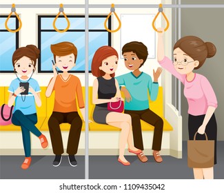 Old Women Standing In Electric Train. Young People Sitting But No One Standing Up For Her, People, Lifestyle, Generation, Age