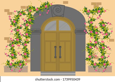 Old wooden door to stone house. Door is large in Mediterranean style. Antique metal handles, decor with an arch, climbing roses branching on wall. Vector illustration in flat style.