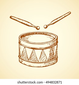 Old wooden kid tambourine kettle and beater isolated on white backdrop. Freehand outline ink hand drawn picture sketchy in art vintage scribble style pen on paper. View closeup with space for text