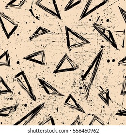 Old worn, scratched vector pattern. Triangles and points are laid out in an interesting seamless pattern.Funny wallpaper for textile and fabric. Fashion style.    