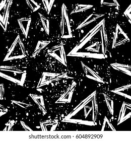 Old worn, scratched vector pattern. Triangles and points are laid out in an interesting seamless pattern.Funny wallpaper for textile and fabric. Fashion style. Colorful bright.