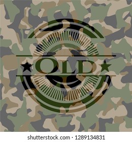 Old written on a camouflage texture