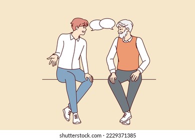 Old and young men sitting together talking. Older and younger male generation with speech bubbles engaged in conversation. Vector illustration. 