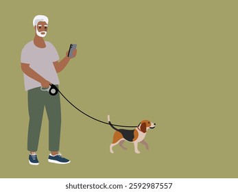 Older grey haired man wearing a grey t-shirt, green pants, and sneakers is using smartphone while holding a retractable leash, which is attached to a Beagle