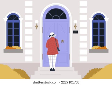 Older lady visiting a building through a front door, autumn city