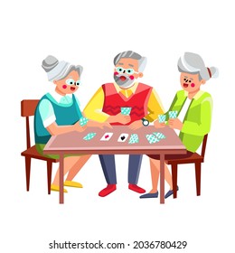 Older People Playing Cards Game Together Vector. Man And Women Friends Pensioners Sitting At Table And Playing Cards. Characters Elderly Players Funny Leisure Time Flat Cartoon Illustration