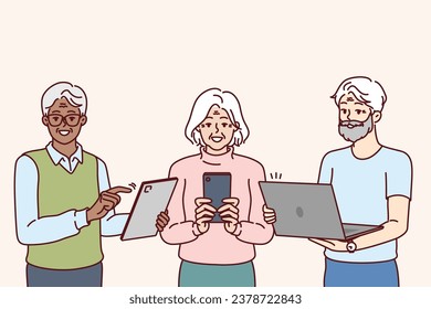 Older people use gadgets and learn digital literacy and internet surfing through phone or laptop. Smiling pensioners stand with gadgets in hands urging peers to use online services