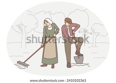 Old-fashioned people working in field . Vector Old-fashioned people in traditional clothes working in garden together. Old couple in ancient way do agriculture outdoors. Vector illustration.