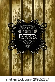 old-fashioned retro label beer on a wooden background