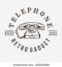 old-fashioned telephone logo on a white background