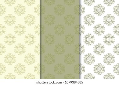 Olive green floral backgrounds. Set of seamless patterns for textile and wallpapers