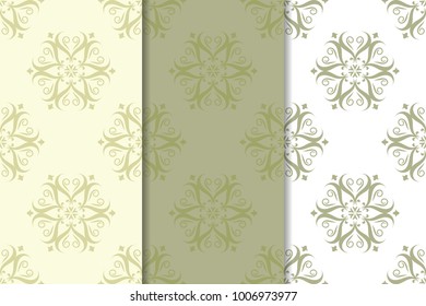 Olive green floral designs. Set of seamless patterns for textile and wallpapers