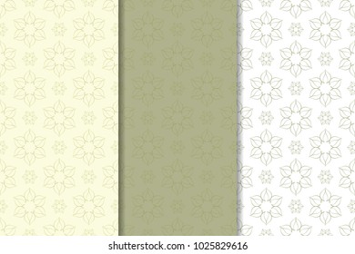 Olive green set of floral ornaments. Seamless patterns for textile and wallpapers