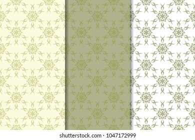 Olive green set of floral ornaments. Seamless patterns for textile and wallpapers