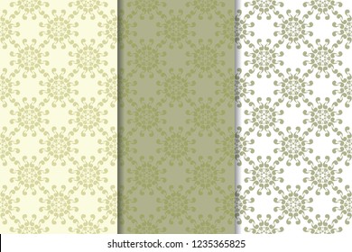 Olive green set of floral ornaments. Seamless patterns for textile and wallpapers