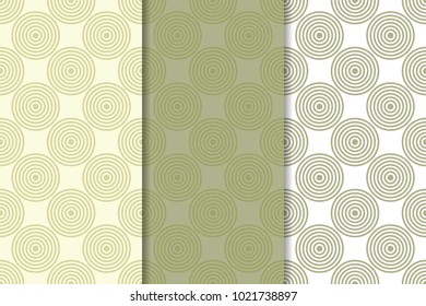 Olive green and white geometric ornaments. Set of vertical seamless patterns for web, textile and wallpapers