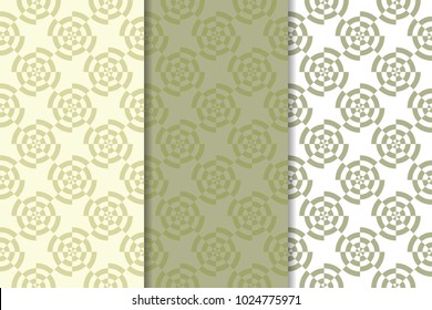 Olive green and white geometric ornaments. Set of vertical seamless patterns for web, textile and wallpapers