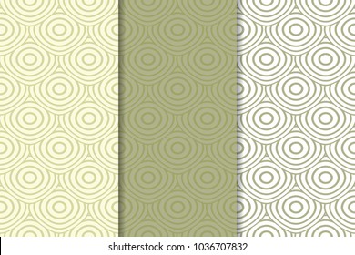 Olive green and white geometric ornaments. Set of vertical seamless patterns for web, textile and wallpapers