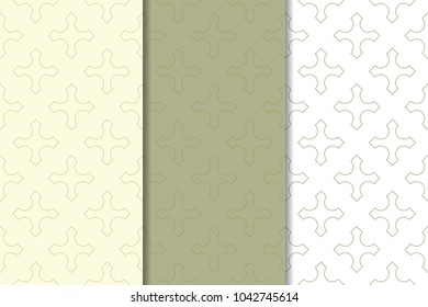Olive green and white geometric ornaments. Set of vertical seamless patterns for web, textile and wallpapers