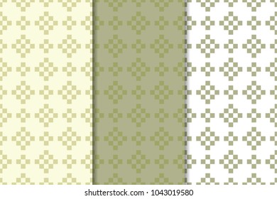 Olive green and white geometric ornaments. Set of vertical seamless patterns for web, textile and wallpapers