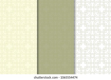 Olive green and white geometric ornaments. Set of vertical seamless patterns for web, textile and wallpapers