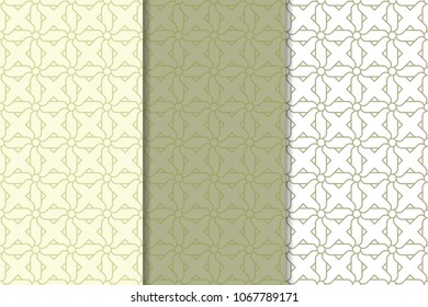 Olive green and white geometric ornaments. Set of vertical seamless patterns for web, textile and wallpapers