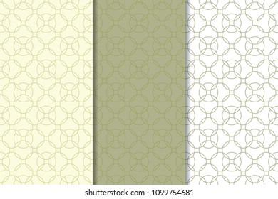 Olive green and white geometric ornaments. Set of vertical seamless patterns for web, textile and wallpapers