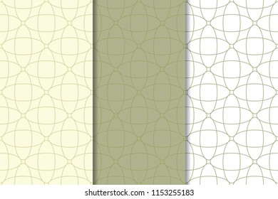 Olive green and white geometric ornaments. Set of vertical seamless patterns for web, textile and wallpapers