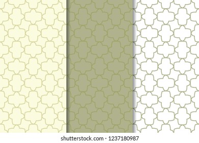 Olive green and white geometric ornaments. Set of vertical seamless patterns for web, textile and wallpapers